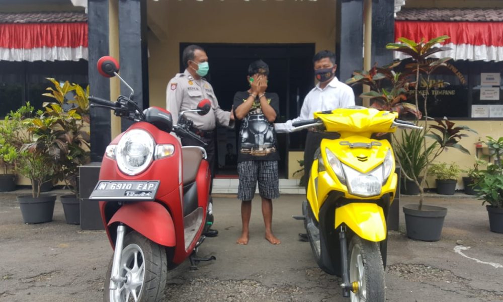Polisi saat merilis tersangka penipuan