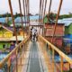 Jembatan Kaca Kampung Warna-Warni Spot Foto Andalan Wisatawan