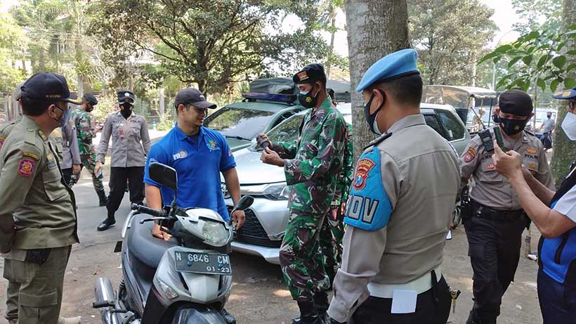 Razia PPKM Mikro Darurat di Kota Malang mendapati warga tanpa masker di Jalan Danau Jonge, Madyopuro Kota Malang.