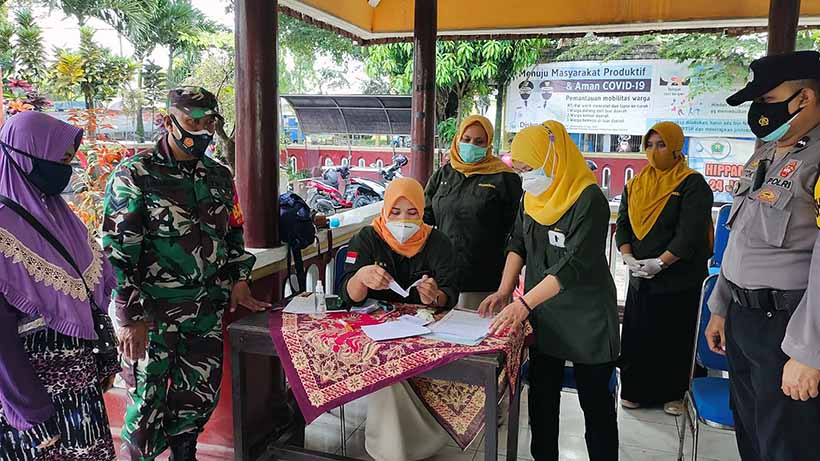 Bantuan PPKM Di Kota Malang Tersalurkan, Pencairan Dikawal Aparat