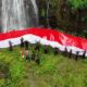 HUT 75 Bhayangkara, Polres Lumajang Kibarkan Bendera Merah Putih Raksasa