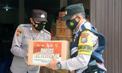 Polres Malang Sebar 3000 Bendera Merah Putih Untuk Warga Miskin